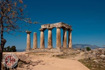 Ruins of Appollo Temple with Fortressat Back in Ancient Corinth, Peloponnese
